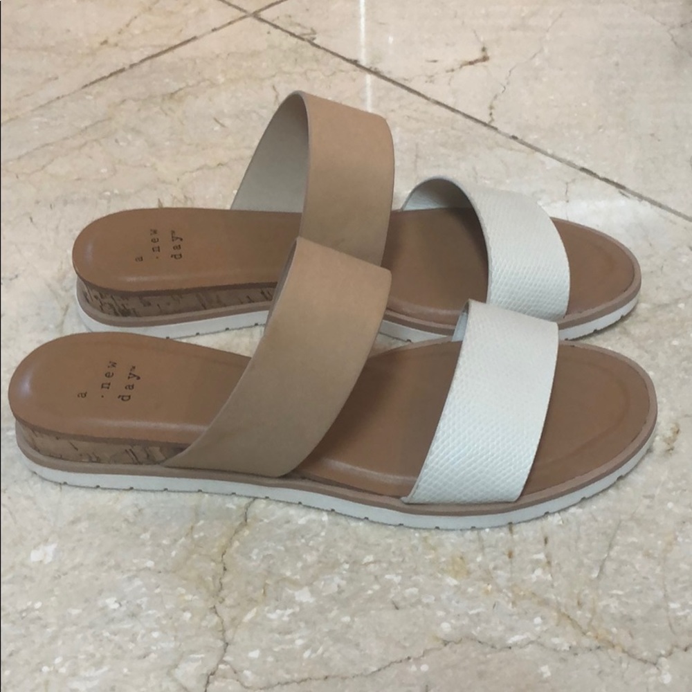 White and tan sandals